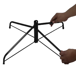 Setting up black metal tree stand on a white background.